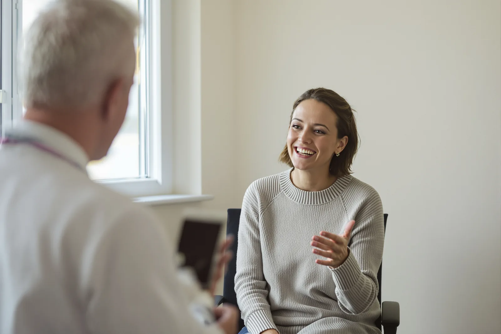 Physician consulting with a patient at Specialist Doctors Group